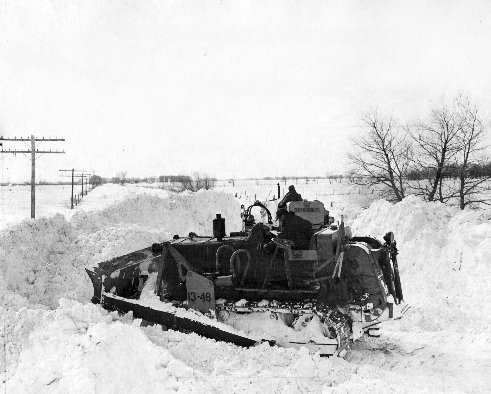 Many difficult road conditions became less hopeless after the Army bulldozers went to work. Published in February 1949.